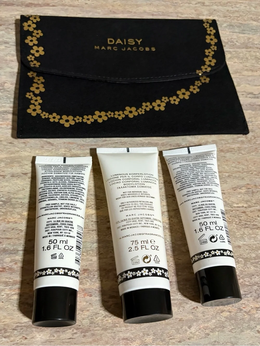 Marc Jacobs Daisy Black & Gold Pouch with Daisy Luminous Body Lotion Trio Set
